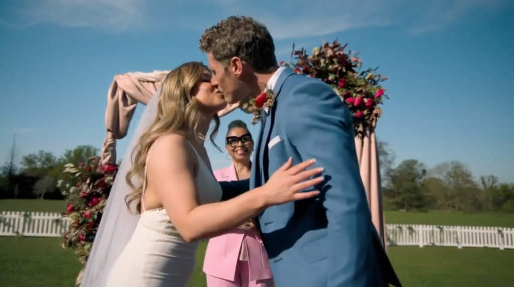 Jonathan & Sophie from Married at First Sight UK shared their first kiss with Celebrant Jennifer Patrice in background